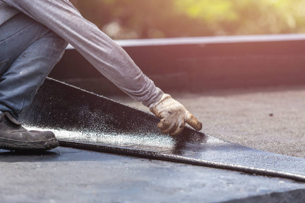 Professional Waterproofing technician working in Findlay, OH